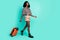 Profile photo of lady step carry baggage case wear leopard print shirt shorts boots isolated teal color background