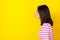 Profile photo portrait of winsome young lady lips kissing empty space dressed trendy striped clothes isolated on yellow