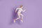 Profile photo of positive sportive lady jump run wear white jumper posing on purple background