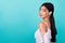 Profile photo of pretty cute filipino lady look camera empty space ad blank isolated on teal color background