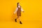 Profile photo of pretty lady step look empty space wear brown overall pullover shoes isolated yellow color background