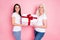 Profile photo of pretty old mother young daughter ladies holding large gift box present hands son grandson birthday wear