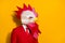 Profile photo of successful anonymous guy wear rooster polygonal mask red suit isolated yellow color background