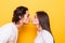 Profile photo of young beautiful people in love expressing love and affection while kissing each other with closed eyes isolated