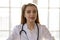 Profile picture of smiling female doctor pose at workplace