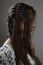 Profile portrait of fashion female brunette with braids