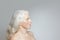 Profile senior woman long white hair