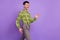 Profile side photo of young handsome shocked smiling man walk unexpected meet isolated on purple color background