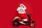 Profile side view of nice bearded worried funky Santa sitting on moped holding in hand clock countdown winter discount