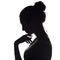 Profile silhouette of a pensive girl with a hand at the chin, a young woman lowered her head down on a white isolated background
