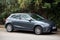 Profile view of grey Seat Ibiza parked in the street