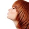 Profile of young beautiful redheaded teen girl