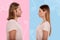 Profile of young couple standing in front of each other