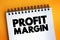 Profit Margin - measure of profitability, calculated by finding the net profit as a percentage of the revenue, text on notepad