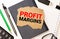 PROFIT MARGIN , on the tablet pc screen held by businessman hands - online, top view