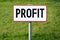 Profit - signboard, grass in background