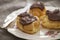 Profiteroles eclairs on a vintage plate