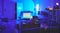 Programming room, information technology or tv in house for software, hacking or coding in neon light at night. It