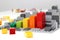 Progress chart made of bricks. Isometric composition of colourful toys on white table.