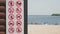 prohibition poster. prohibition sign. close-up. poster with prohibitory signs on the beach. against the backdrop of the