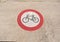 prohibition sign on pavement, no cycling