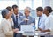 Projecting future growth. Shot of a mature businessman explaining a concept to his colleagues in a meeting.