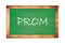 PROM text written on green school board