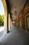 Promenade with long arcade columns surrounding Hofgarten Park in Munich, Germany