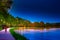 Promenade on the shore of river Rhone in Avignon at night.