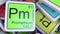 Promethium Pm block on the pile of periodic table of the chemical elements blocks. 3D rendering