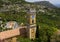 Prominent ochre colored church and clocktower, Eze Village, France.