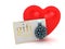 Promo Day for Valentine`s Day. Heart and gift card with ribbon