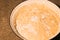 Proofing dough for baking cakes. Dough in a bowl on the table