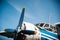 The propeller of a retro aircraft against the blue sky