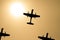 Propellor fighter Airplane silhouettes and sun