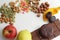 Proper nutrition, fruits apples and lemons and dried fruits dates and nuts with seeds or sweets harmful to health are chocolate, c