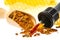 Propolis tincture and a wooden spoon of propolis granules