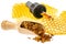 Propolis tincture and a wooden spoon of propolis granules