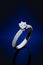 Proposal diamonds ring on blue background