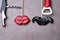 props lips and Black Mustache, with turn- screws, heterosexual, on stone background