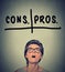 Pros and cons, for and against argument concept. Woma deciding