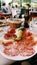 Prosciutto bacon ham pork salami plate restaurant meal