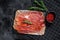 Prosciutto crudo, italian salami, parma ham. Antipasto plate. Black background, top view