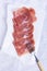 Prosciutto crudo snack, spanish jamon. Dry-cured pig meat.