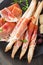 Prosciutto ham and grissini bread sticks. italian antipasto