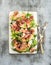 Prosciutto, melon, fig and soft cheese salad on a