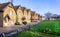 Prospect Square with workers houses built around grassy common in Westbury, Wiltshire, UK