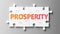 Prosperity complex like a puzzle - pictured as word Prosperity on a puzzle pieces to show that Prosperity can be difficult and