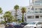 Protaras, Cyprus, 09/01/2018: Beautiful white resort hotel with parking by the sea on a sunny day