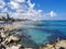 Protaras. Famagusta area. Cyprus. Large stones near the shore, clear water of the Mediterranean Sea, a view of the sandy large